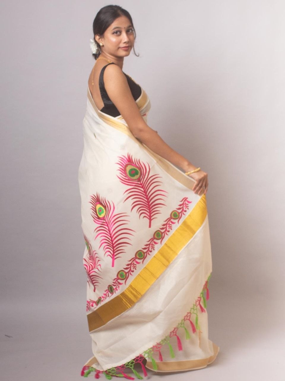 Kerala Onam Kasavu Saree with Peacock Feather Print